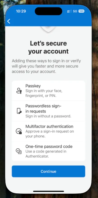 Microsoft Authenticator on iPhone showing the Continue button to secure the account